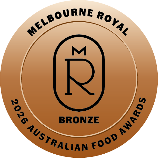 A circular bronze award badge reading 'MELBOURNE ROYAL 2026 AUSTRALIAN FOOD AWARDS' with a central stylized 'MR' monogram and the word 'BRONZE'.